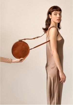 Шкіряна кругла сумка кроссбоді Amy S коричнева вінтаж